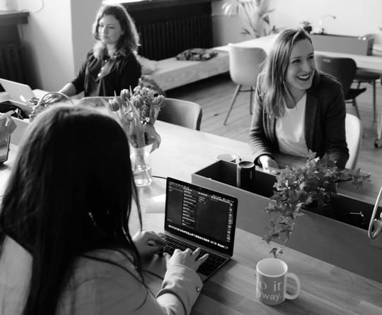 women at table